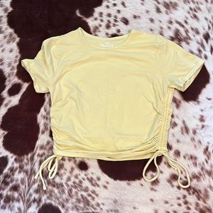 Yellow crop top. Size large.